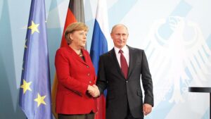 Linke will Merkel für Friedensgipfel engagieren